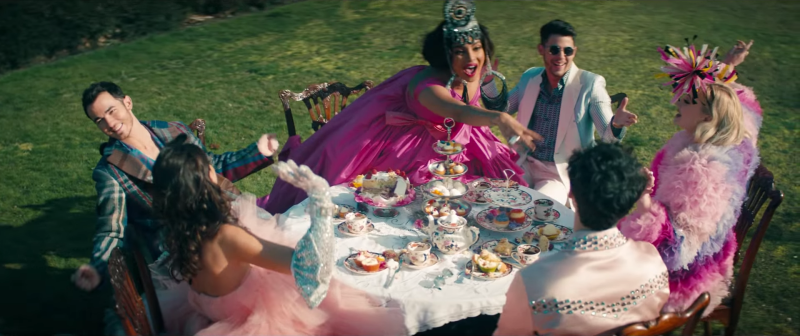 Jonas Brothers music video dinner outside scene