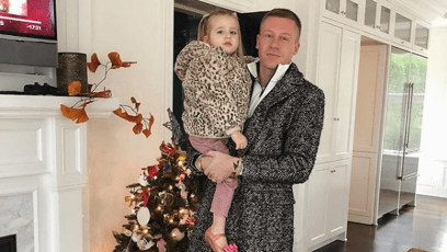 macklemore with his daughter wearing leopard