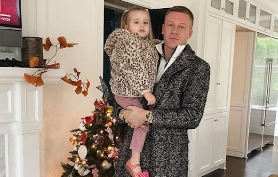 macklemore with his daughter wearing leopard