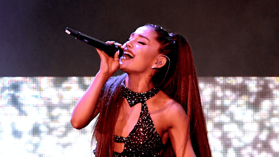 Ariana Grande singing at the 2018 iHeartRadio Music Awards.