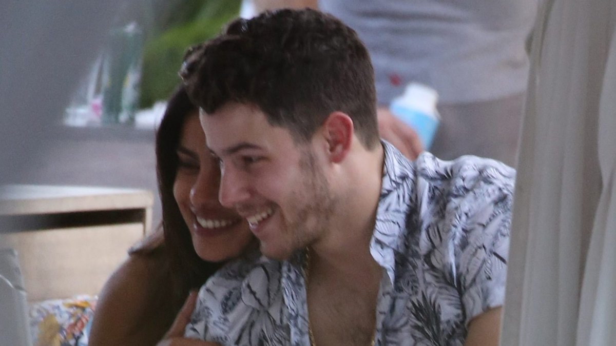 nick-jonas-priyanka-chopra-pool-snuggle-miami