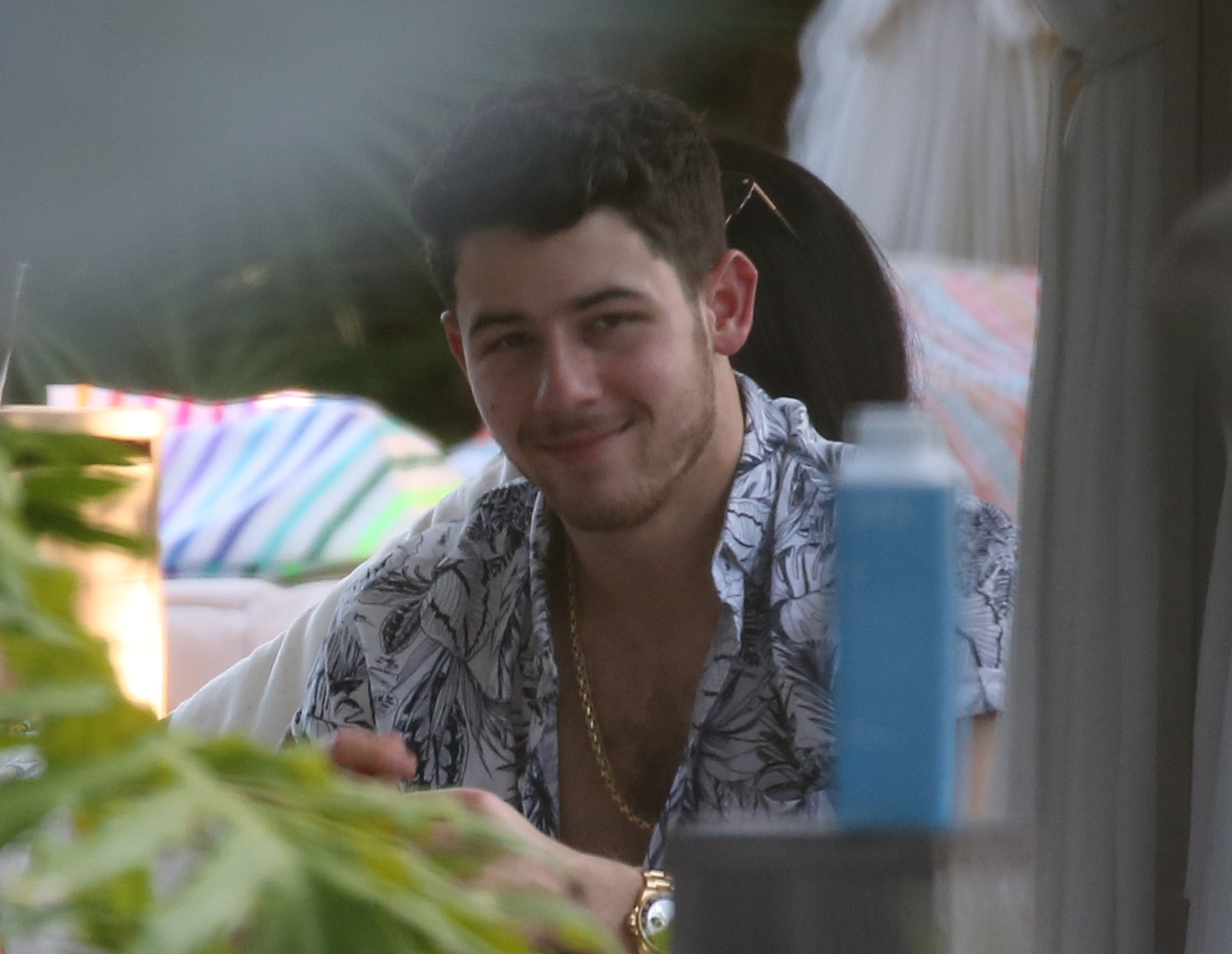 nick-jonas-priyanka-chopra-pool-snuggle-miami