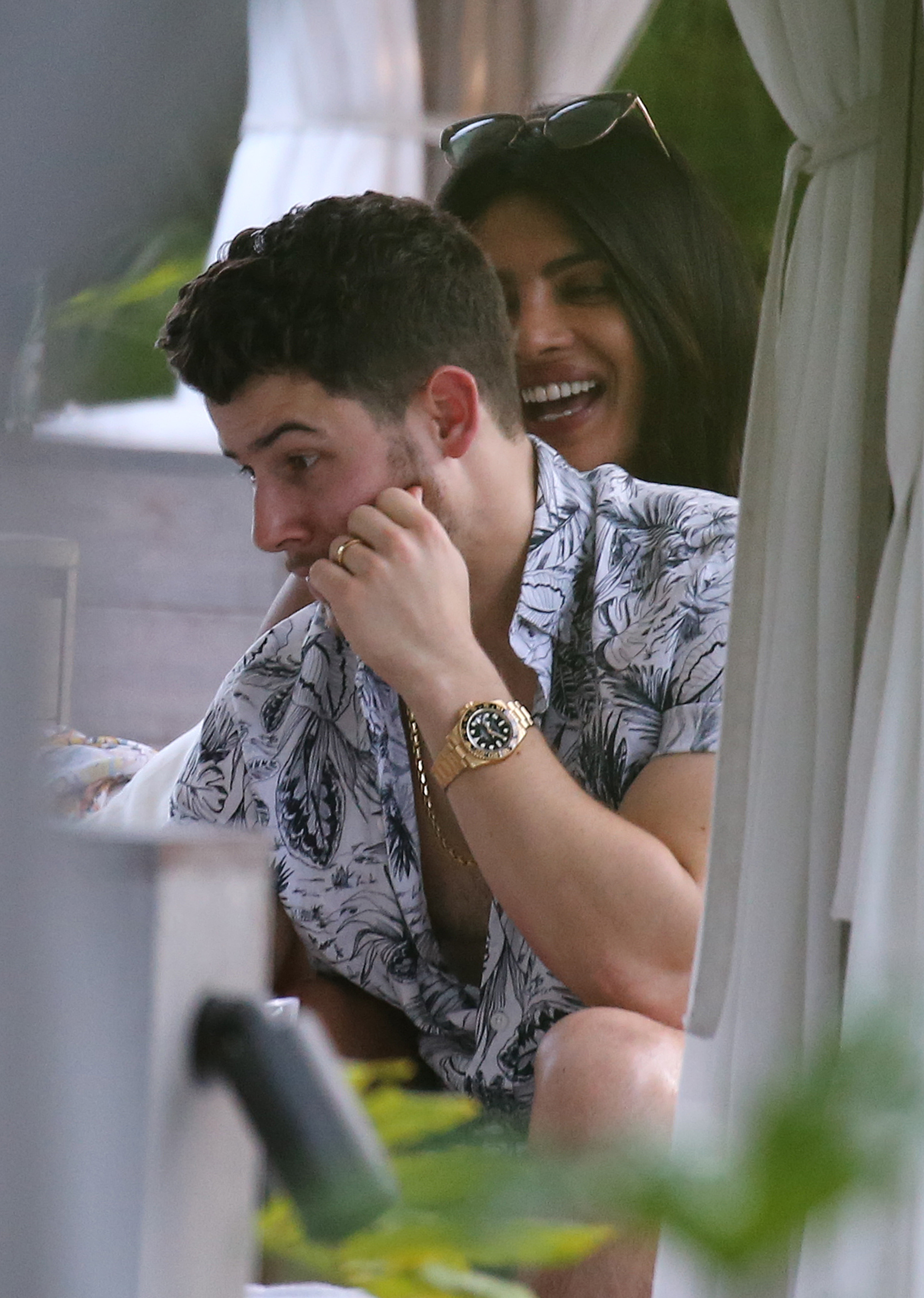 nick-jonas-priyanka-chopra-pool-snuggle-miami
