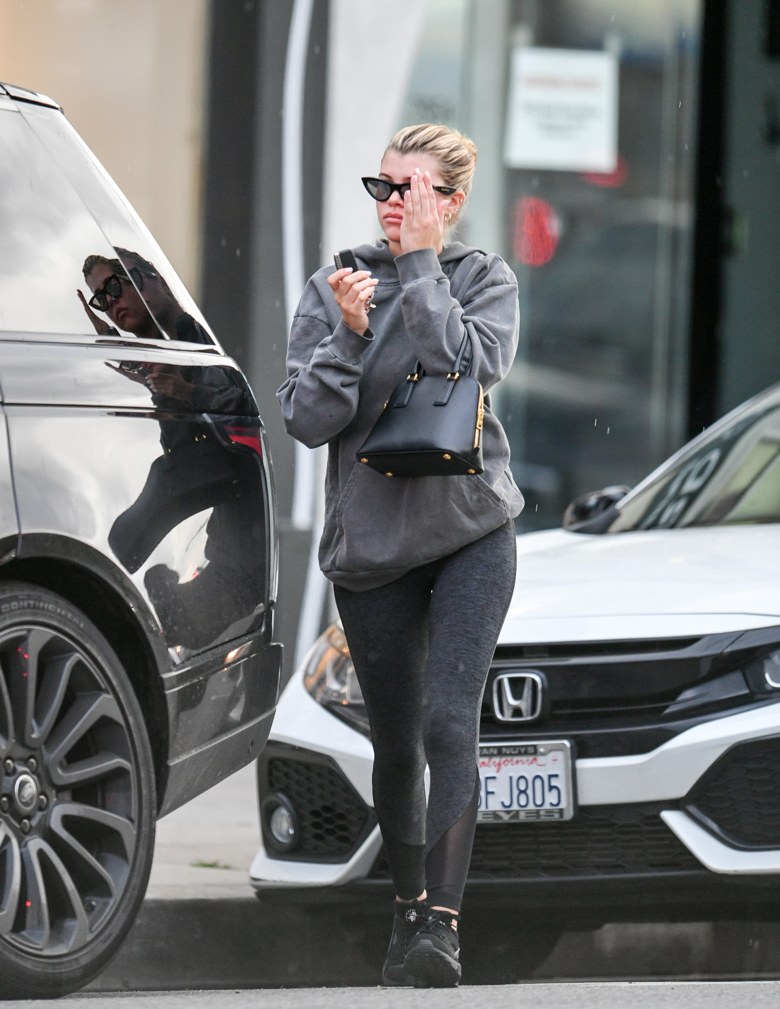 sofia richie athleisure leggings sweatshirt scott disick