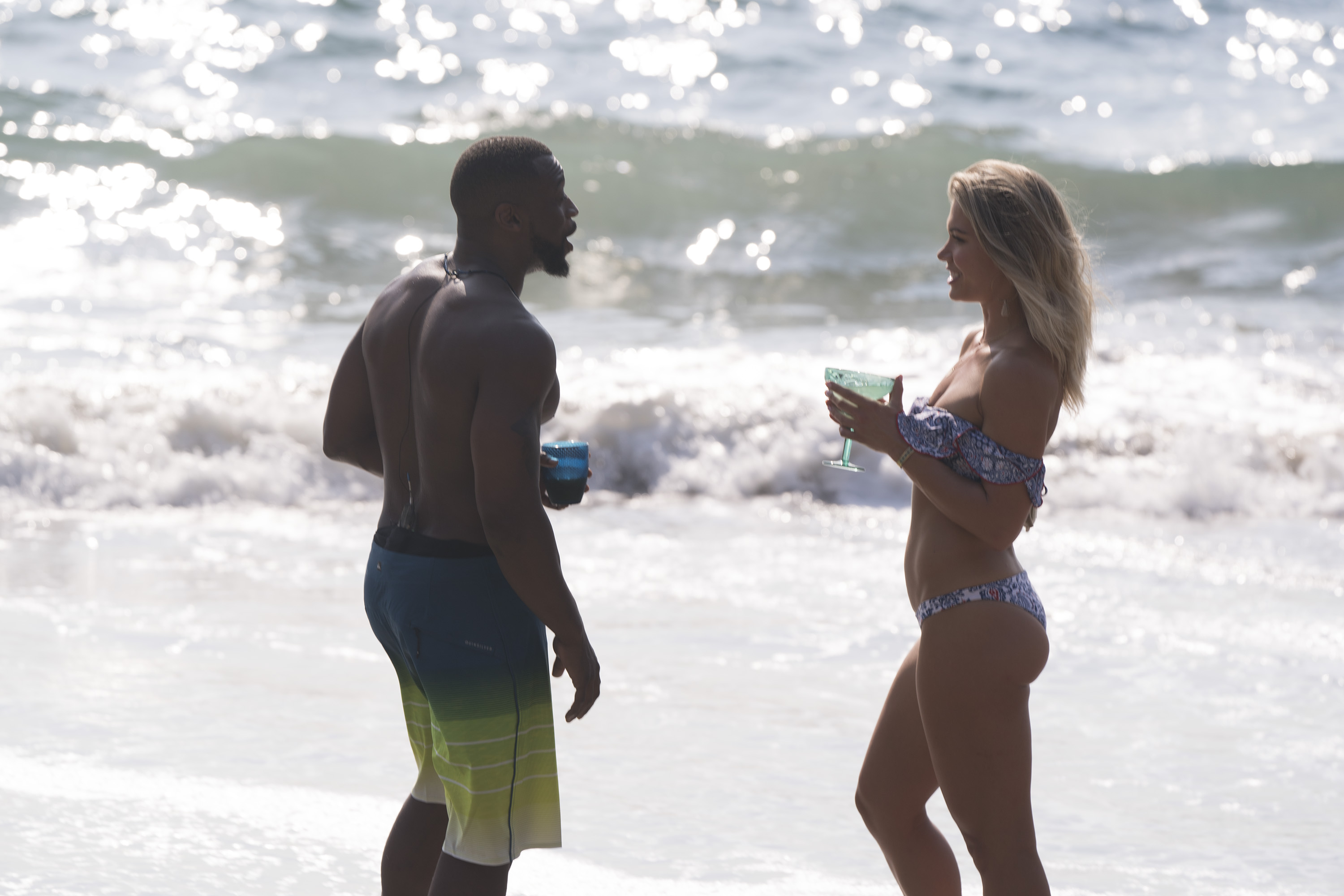 Krystal and Kenny beach in swimsuits
