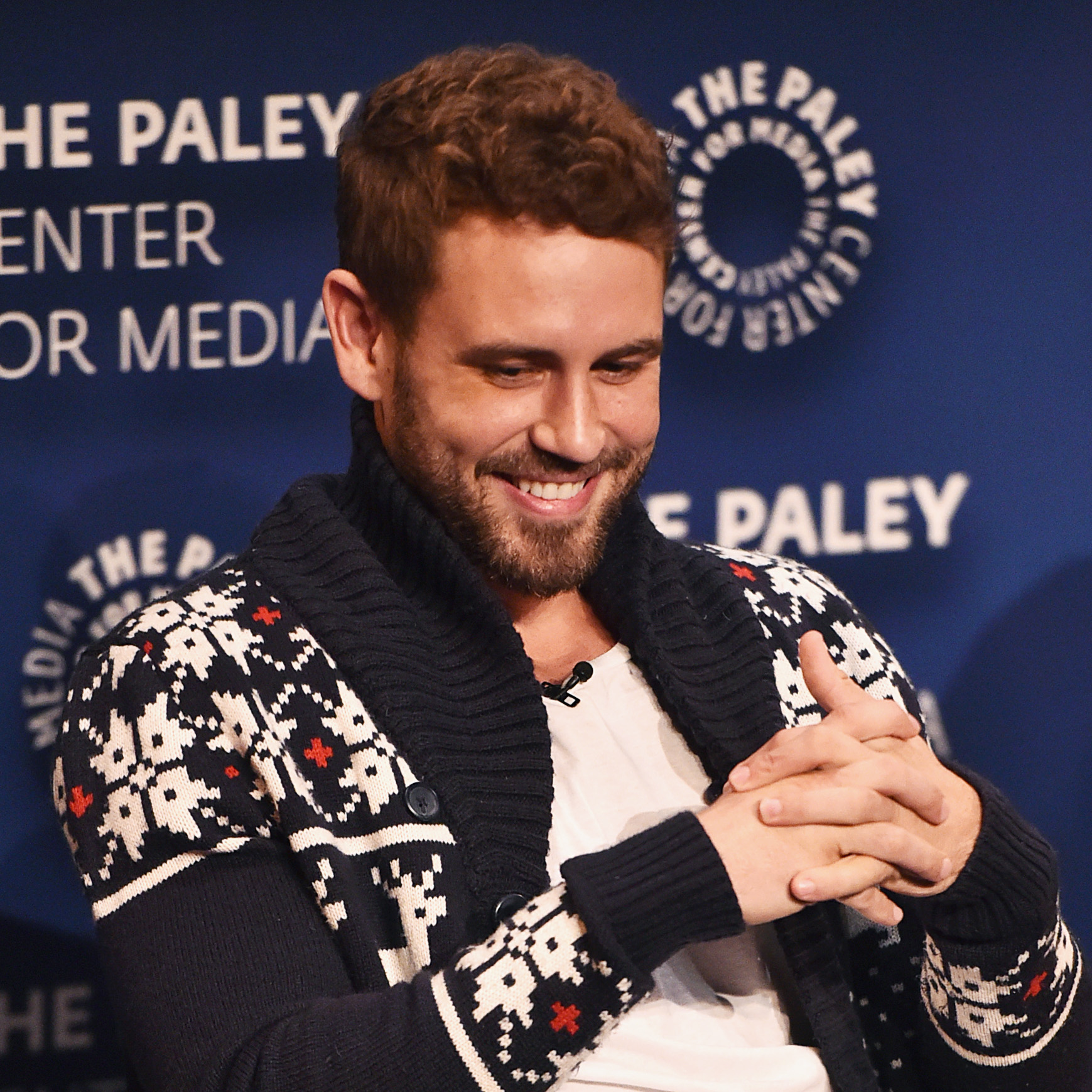 Nick Viall bachelor sweater smiling