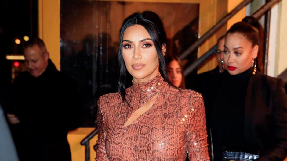 Kim Kardashian snakeskin outfit hair up instagram