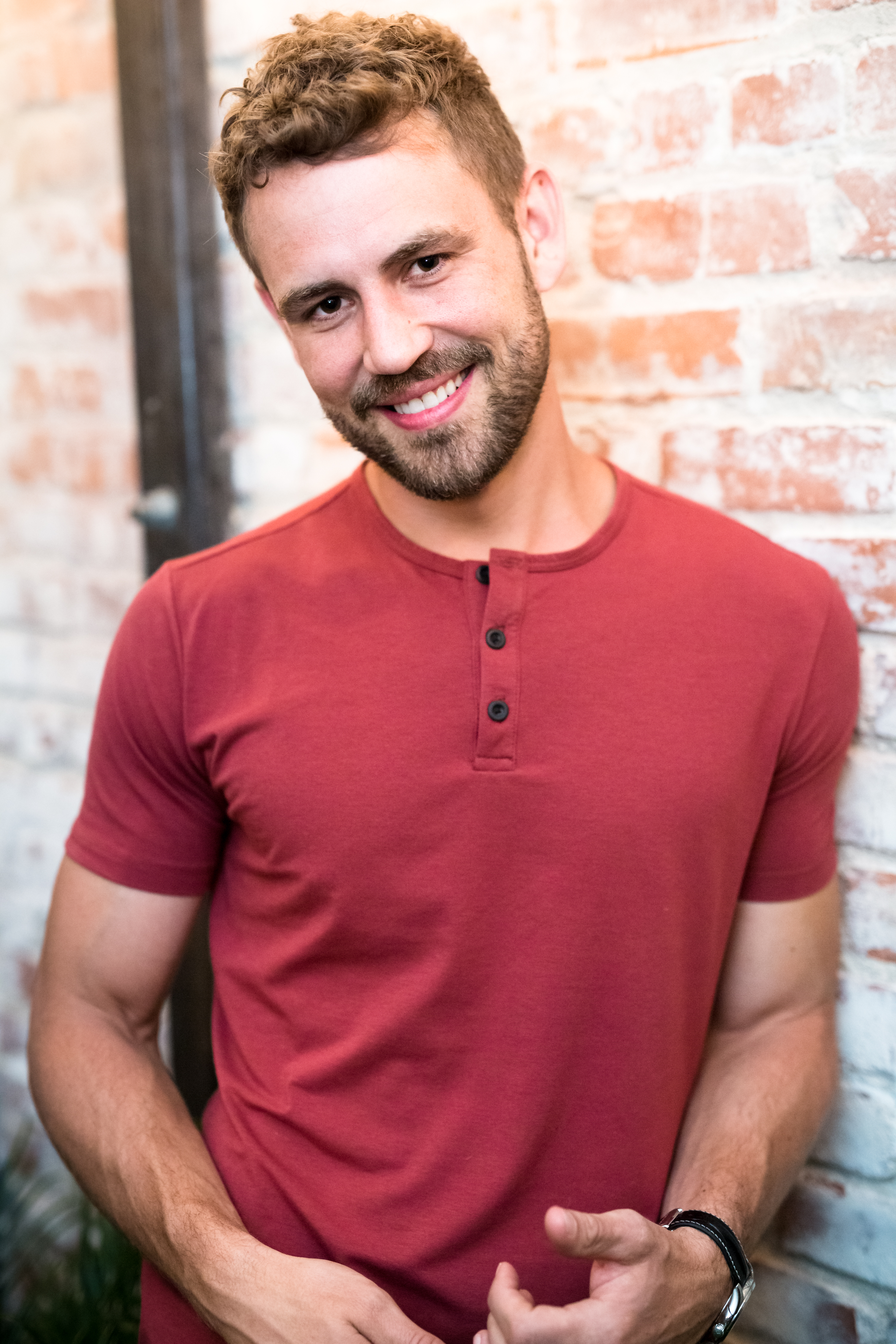 Nick Viall bachelor smiling red shirt