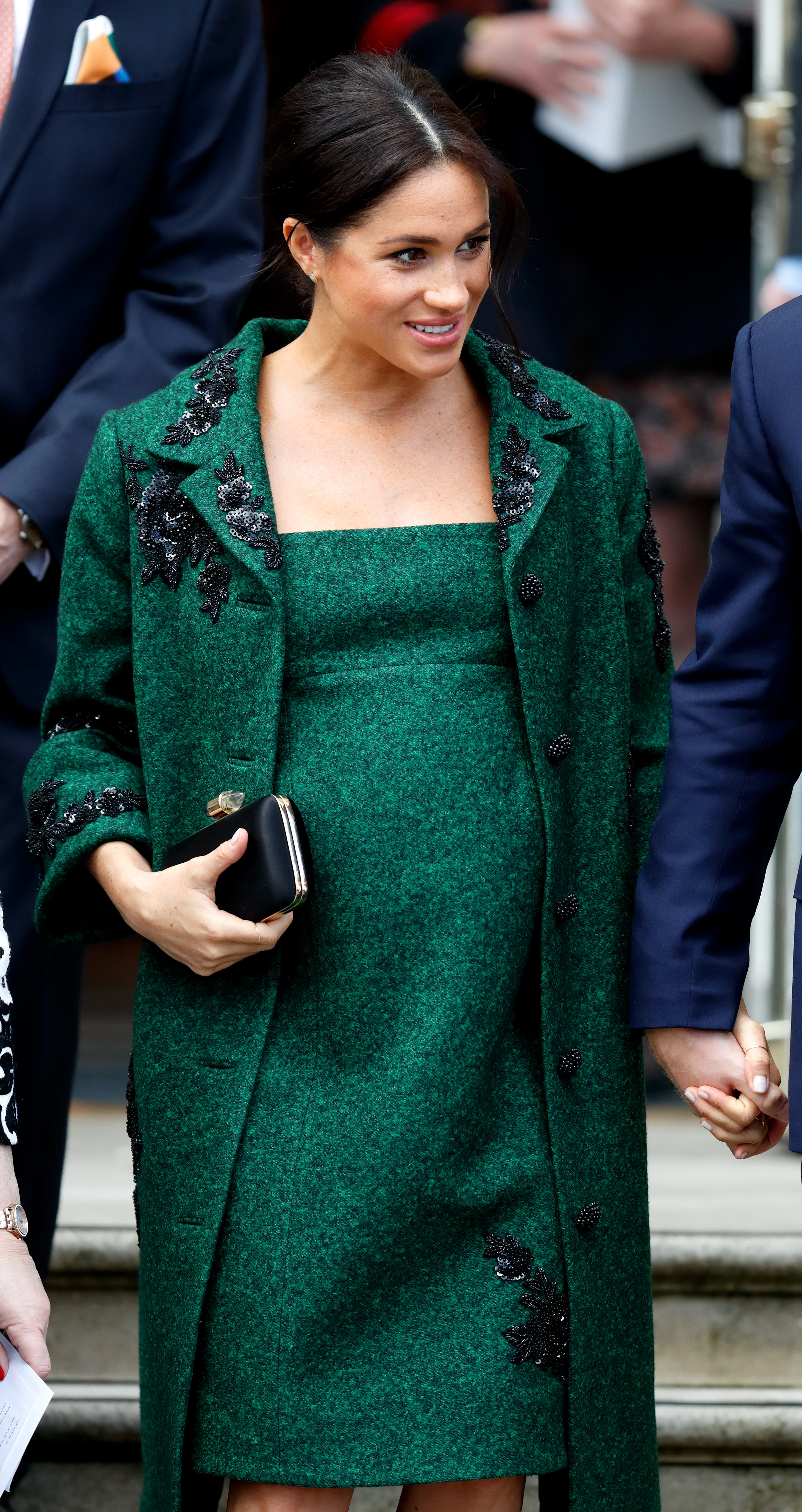 Meghan Markle green dress green coat hair up baby bump