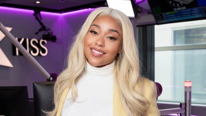 Jordyn Woods met gala invite blonde hair white turtleneck