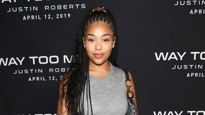 Jordyn Woods makeup free braids grey dress skin