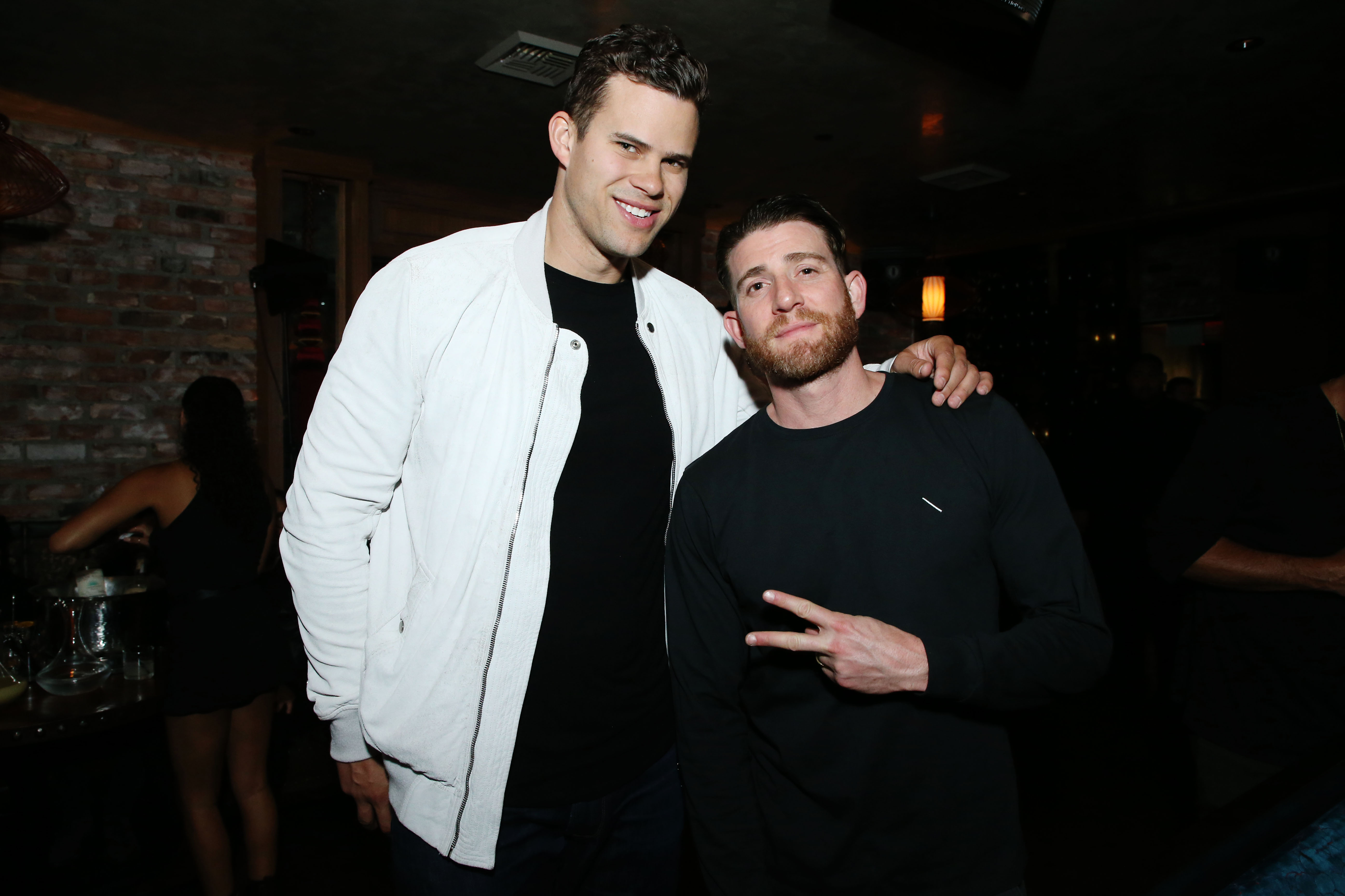 Kris Humphries wearing a white jacket at TAO opening