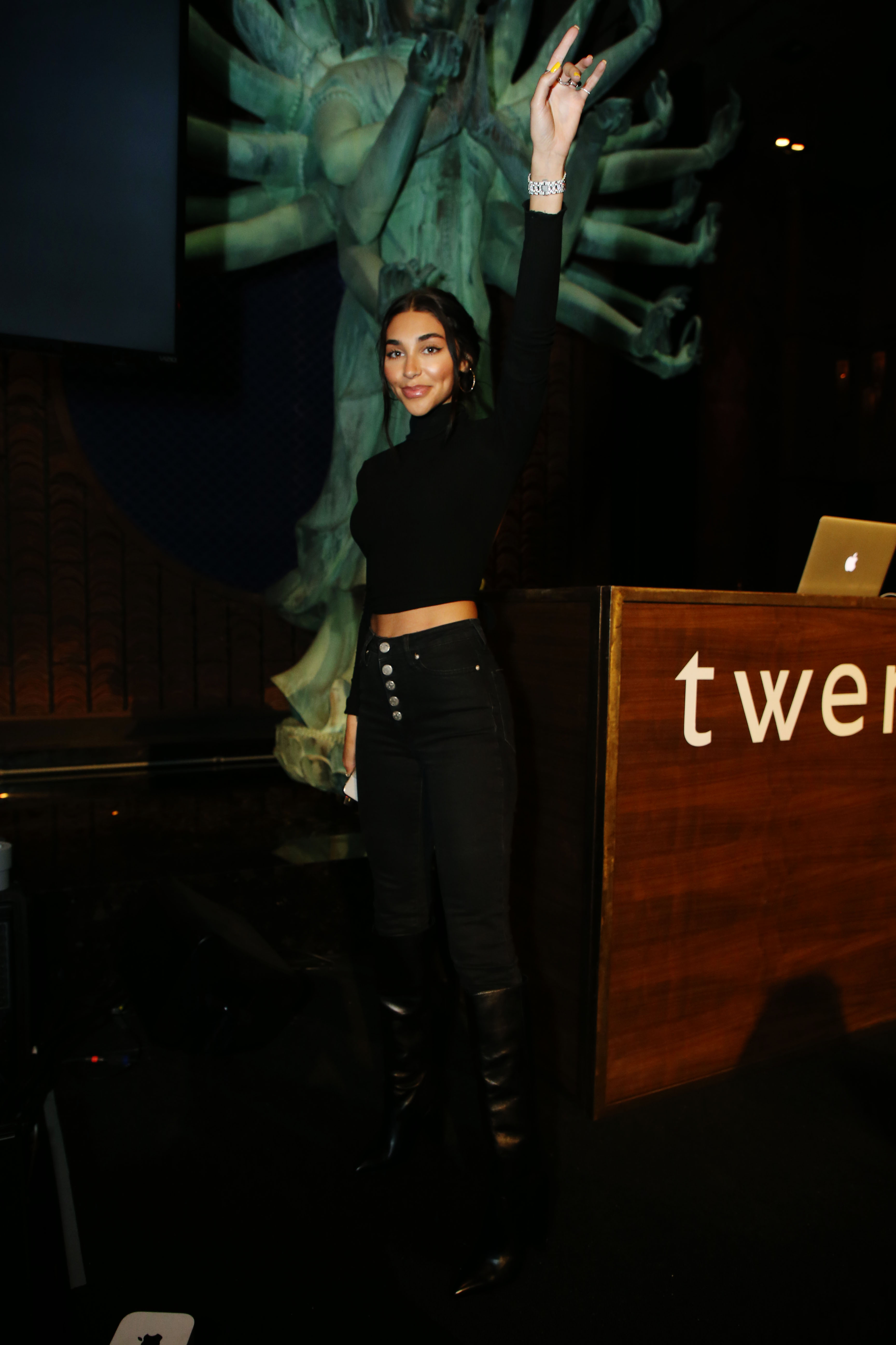 Chantel Jeffries at TAO opening wearing black turtleneck