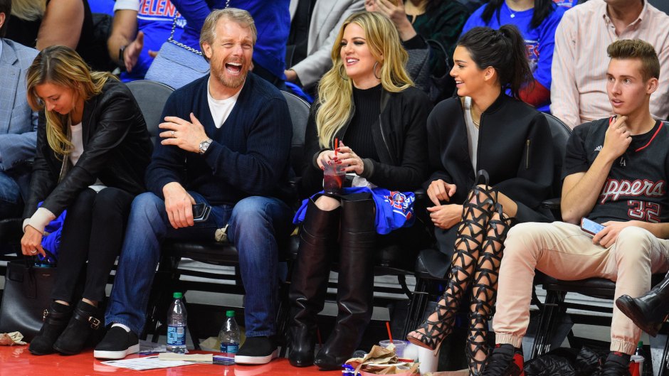 Gunnar Peterson in Jeans and a T-shirt with Khloe Kardashian and Kendall Jenner at a Basketball Game