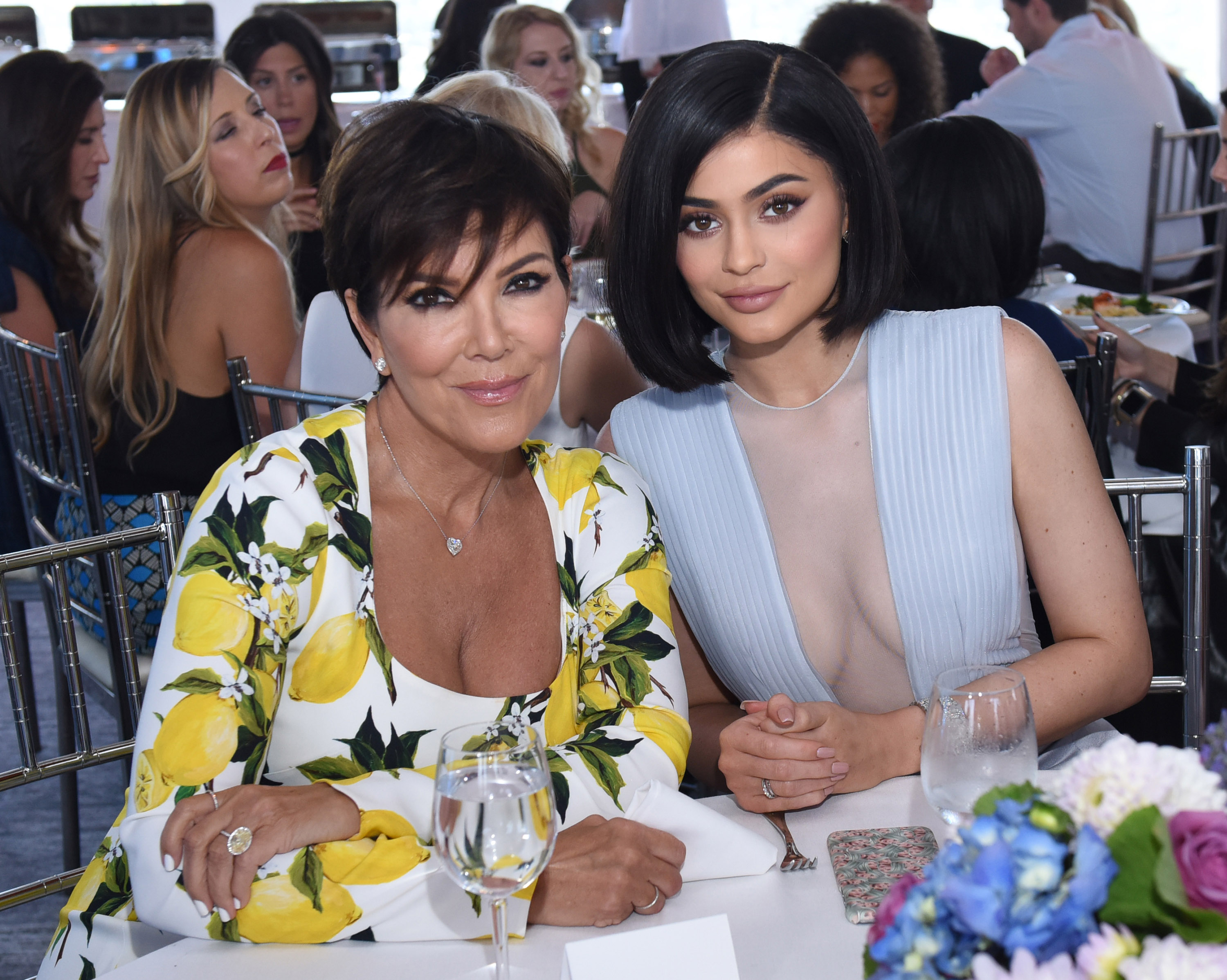Kylie Jenner sheer blue dress Kris Jenner lemon sweater