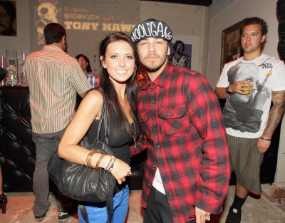 audrina patridge with justin bobby wearing a checkered shirt