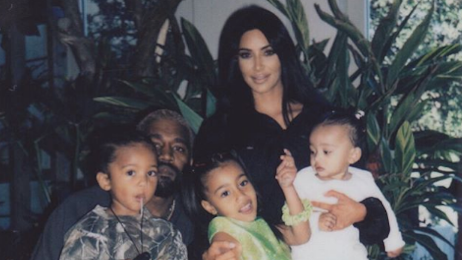 Kim Kardashian and Kanye West with their babies