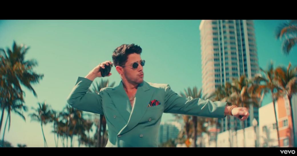 Nick Jonas cologne in cool music video