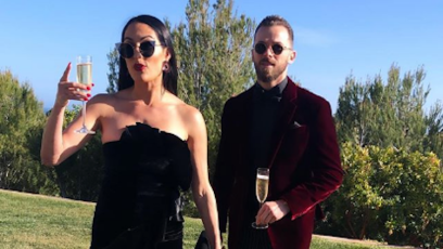 Nikki Bella black dress red lips champagne Artem Chigvintsev red velvet suit wedding