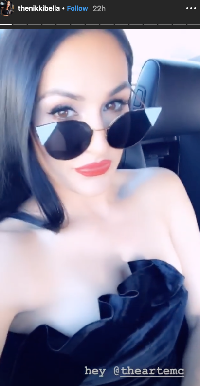 Nikki Bella red lipstick black dress selfie