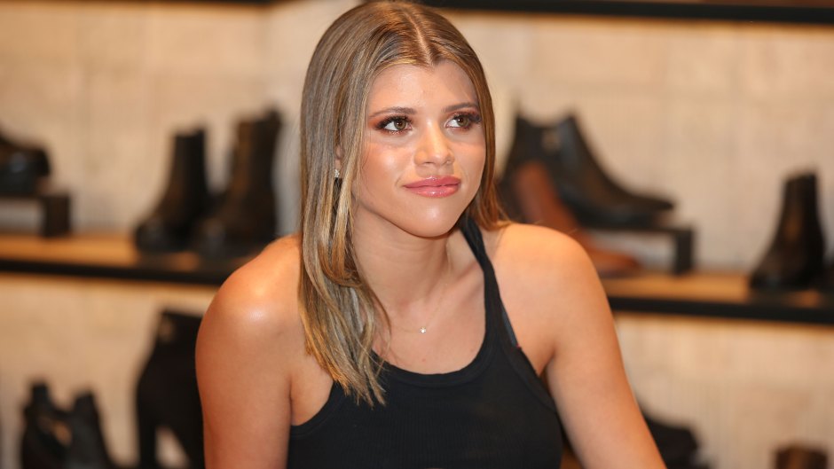 Sofia Richie looks towards Scott Disick (unseen) as they make a store appearance at Windsor Smith at Chadstone Shopping Centre on November 1, 2018 in Melbourne, Australia.