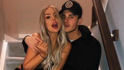 Tana Mongeau and Brad Sousa posing