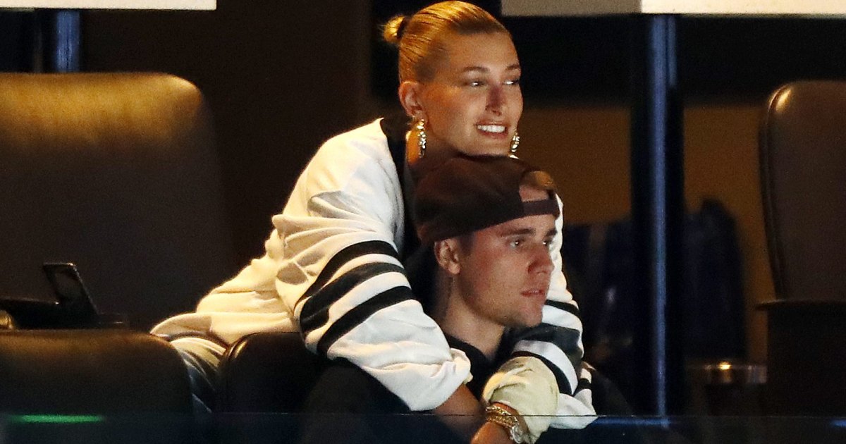 Justin Bieber and wife Hailey Baldwin cuddle up at a junior hockey game in  Canada (Photos)