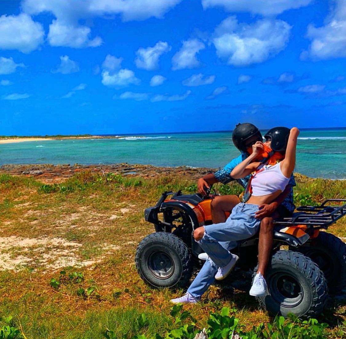 Bella Hadid and The Weeknd on an ATV
