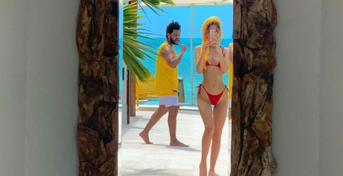 The Weeknd and Bella Hadid at the beach