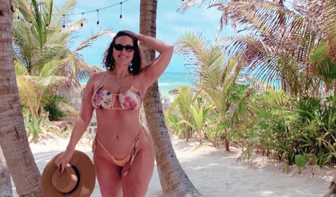 Ashley Graham strips down to a tiny bikini with Sports