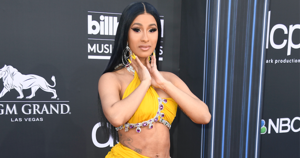 cardi b red carpet yellow dress editorial photography. Image of carpet, celebrities Cardi B's Billboard Music Awards
