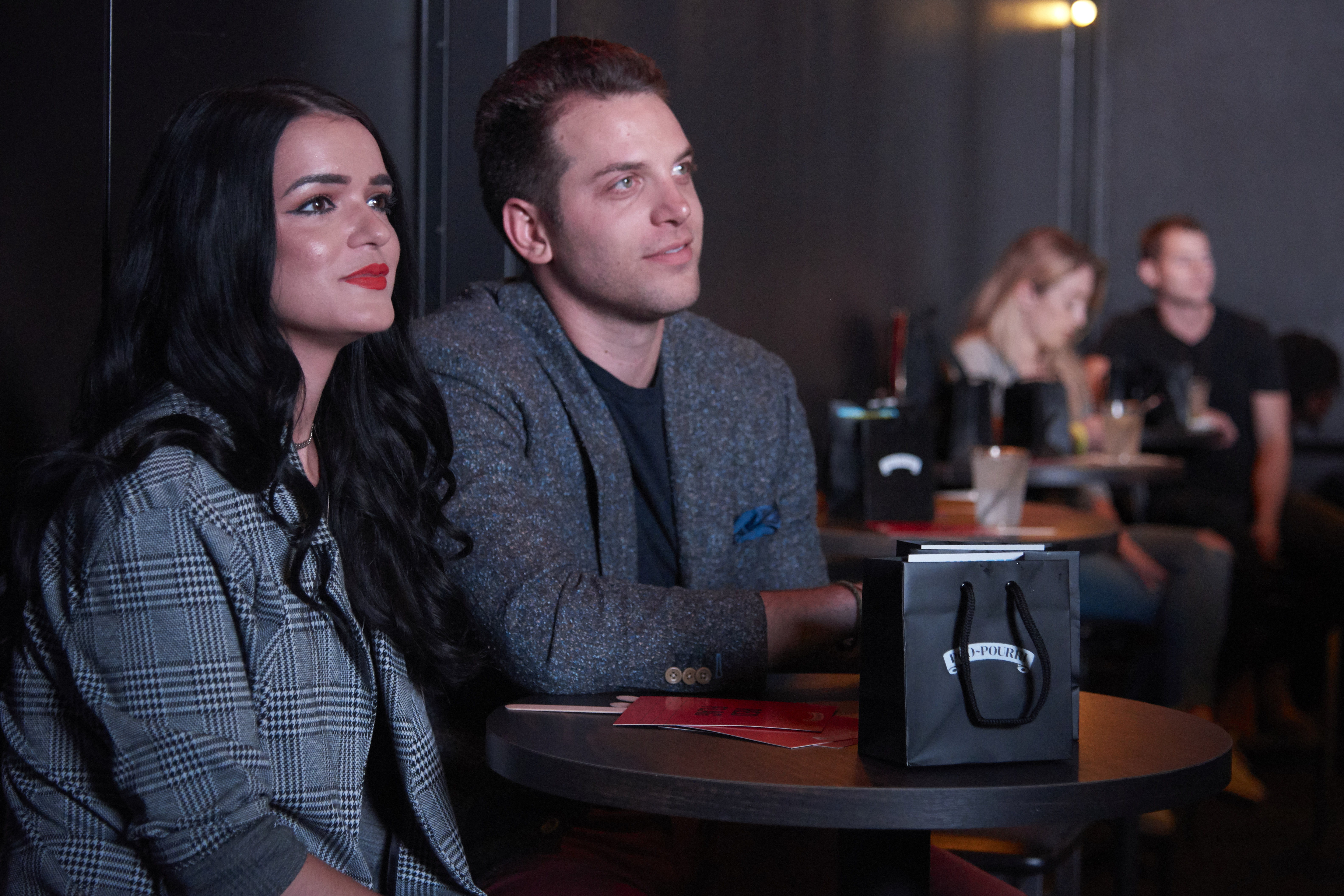 Bachelor Raven Gates red lipstick and Adam Gottschalk grey suits couple engaged dating