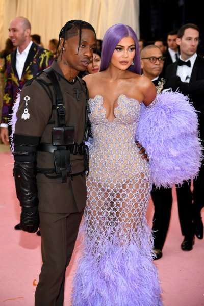 Kylie Jenner Travis scott met gala red carpet purple dress purple hair feathers
