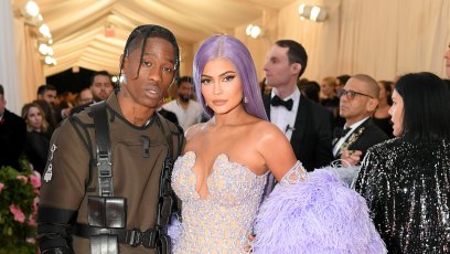 Kylie Jenner Travis Scott 2019 met gala purple hair mermaid gown military suit