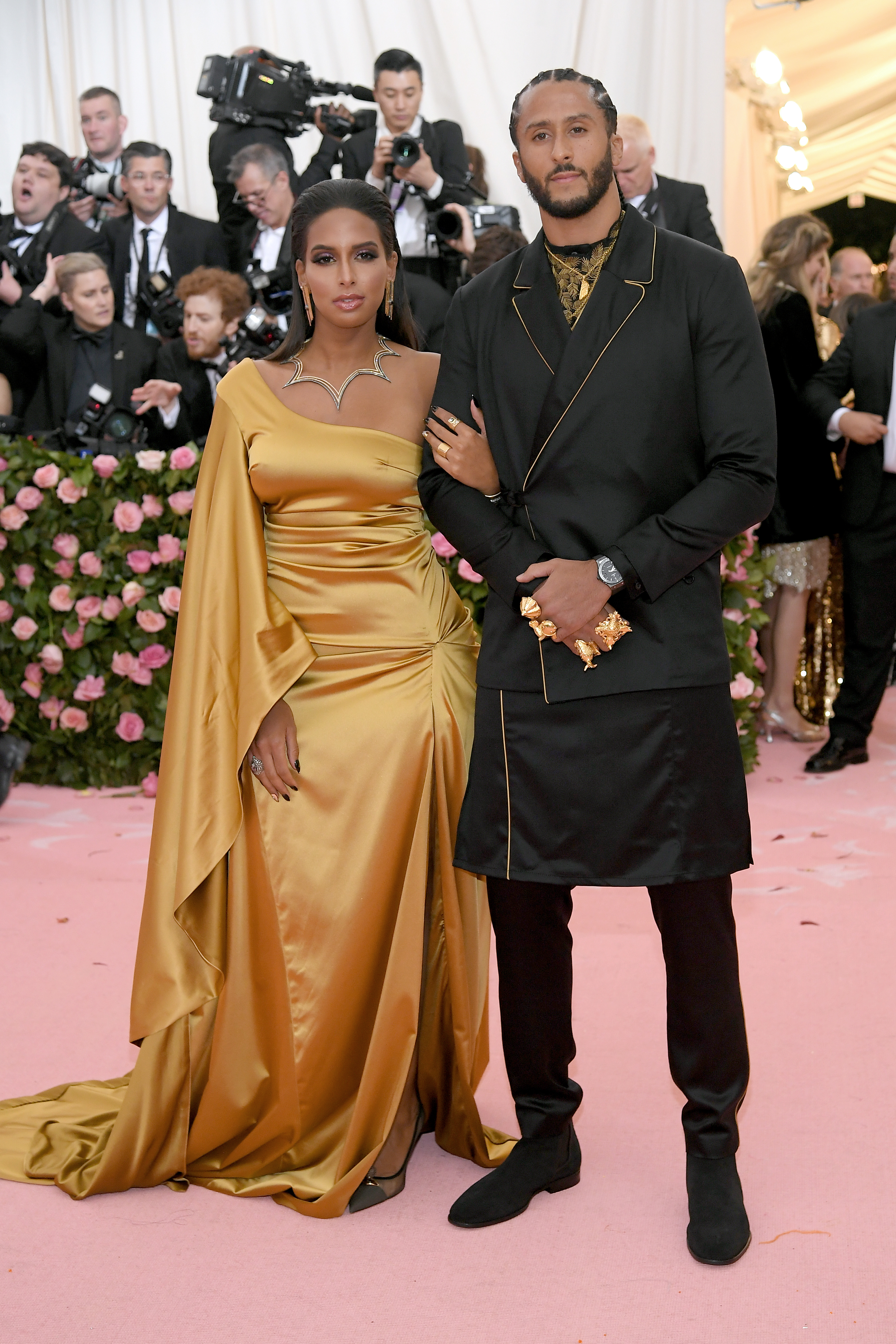 Nessa and Colin Kaepernick 2019 met gala gold dress suit