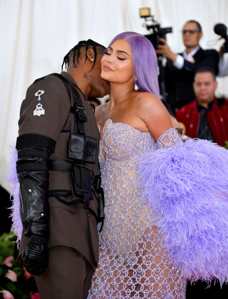 Kylie Jenner Travis Scott 2019 met gala kiss pda red carpet purple dress
