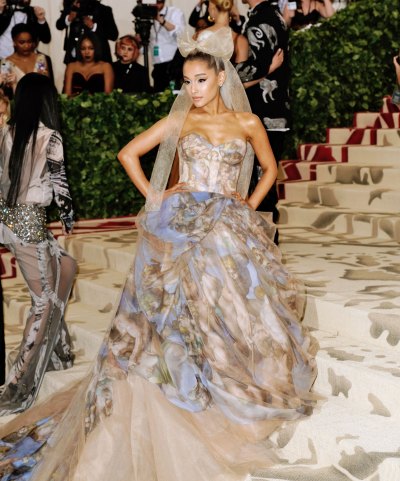 Ariana grande 2018 met gala vera wang gown sistine chapel painting heavenly bodies bow in her hair