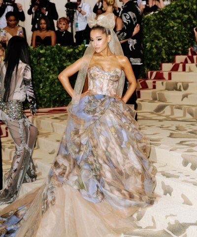 Ariana grande 2018 met gala vera wang gown sistine chapel painting heavenly bodies bow in her hair