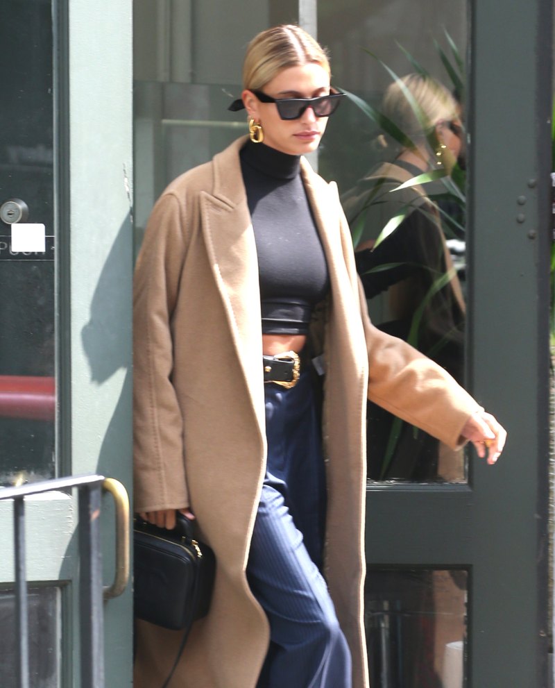 Hailey Baldwin sunglasses purse black crop top turtleneck