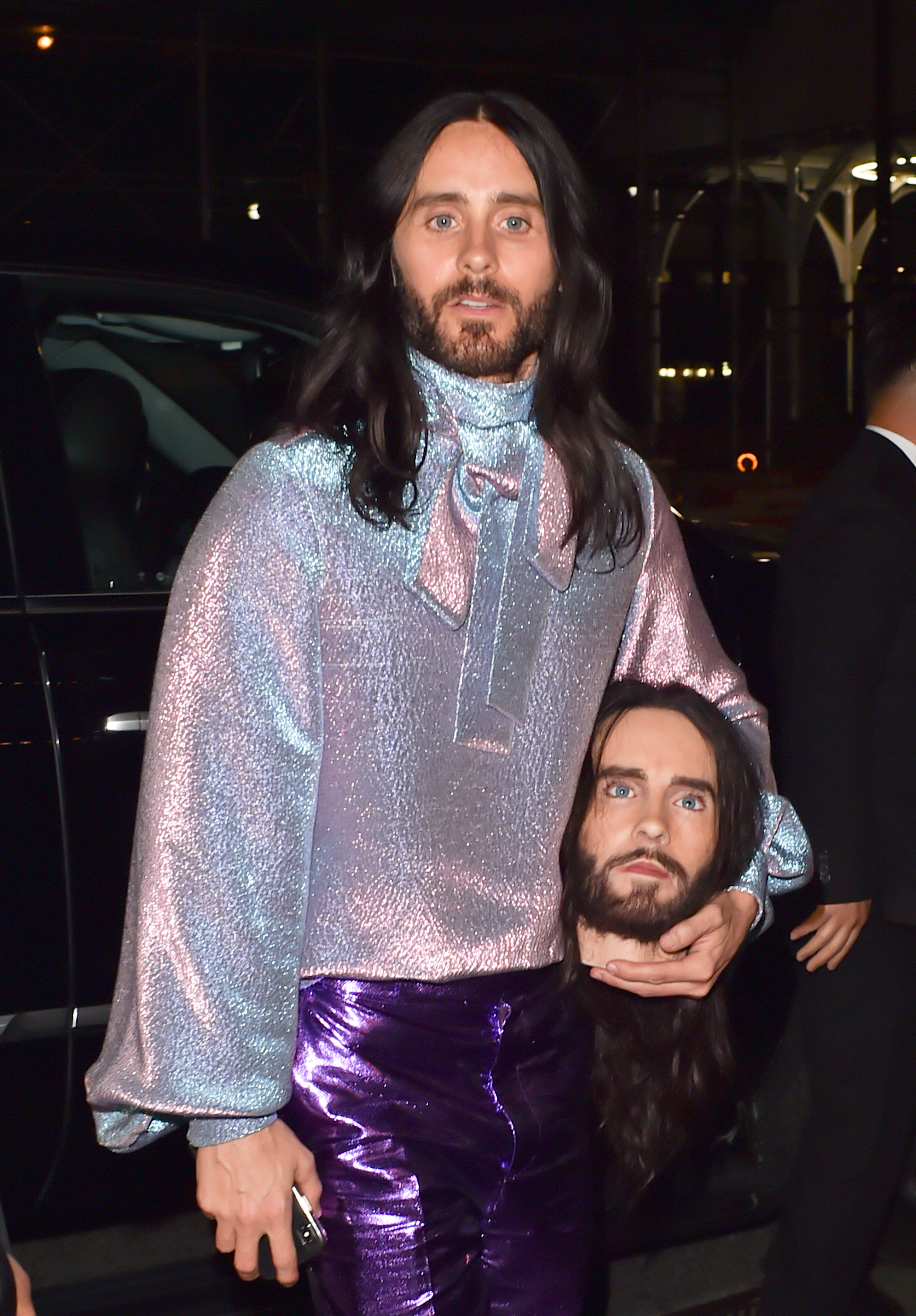 Jared Leto fake head purple pants purple shirt 2019 met gala afterparty