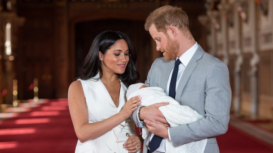 Meghan Markle Wearing White and Prince Harry in a Suit With Their New baby