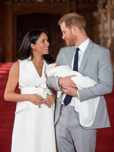 Meghan Markle Wearing White with Prince Harry and Their Baby