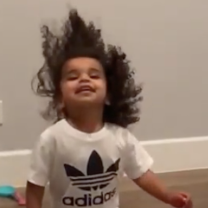 Dream Kardashian headbanging video blac chyna long hair curls adidas sweats