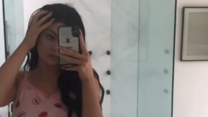 Kylie Jenner pink lip pajamas instagram story body flat stomach small waist