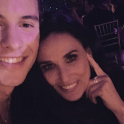 Shawn Mendes and Demi Moore posing for a selfie at the 2019 Met Gala