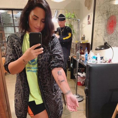 Demi Lovato grandma tattoo mimaw dr. woo ink mirror selfie short hair