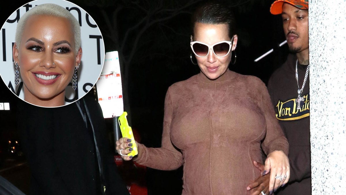 Amber Rose Shows Off Her Growing Baby Bump in Nude Heels and Form-Fitting Dress