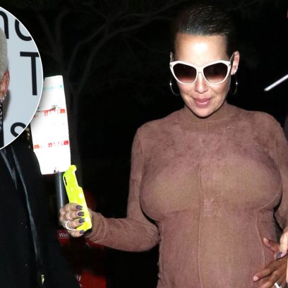 Amber Rose Shows Off Her Growing Baby Bump in Nude Heels and Form-Fitting Dress