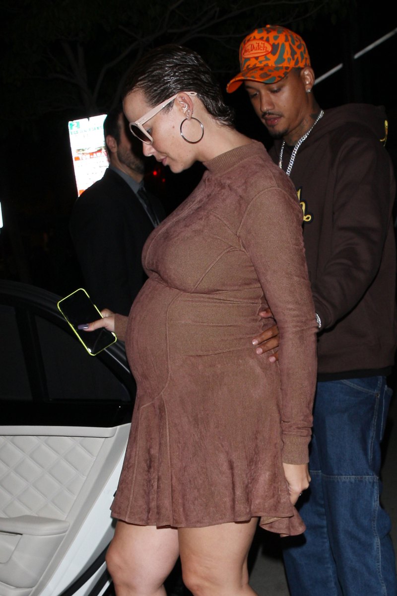 Amber Rose Shows Off Her Growing Baby Bump in Nude Heels and Form-Fitting Dress