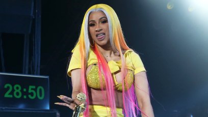 Cardi B Neck Lip Piercings